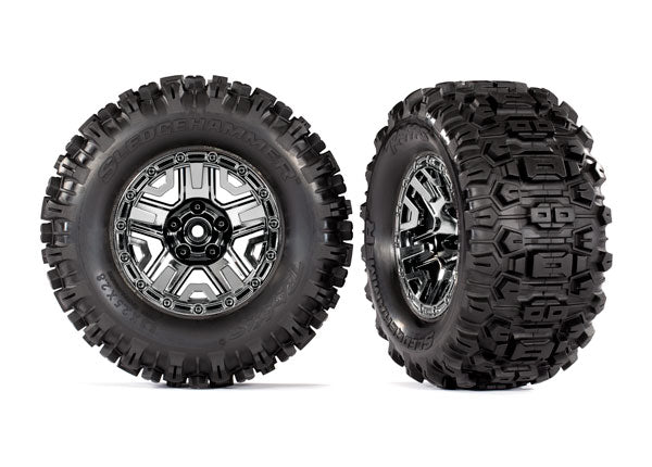 9072 TRAXXAS T&W ASSEM (BLACK CHROME 2.8 WHEELS SLEDGEHAMMER TIRES) (2) (TSM RATED)