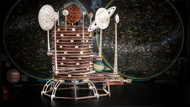 Astronomic toy, mechanical mecanism makes planets to go round the Sun
